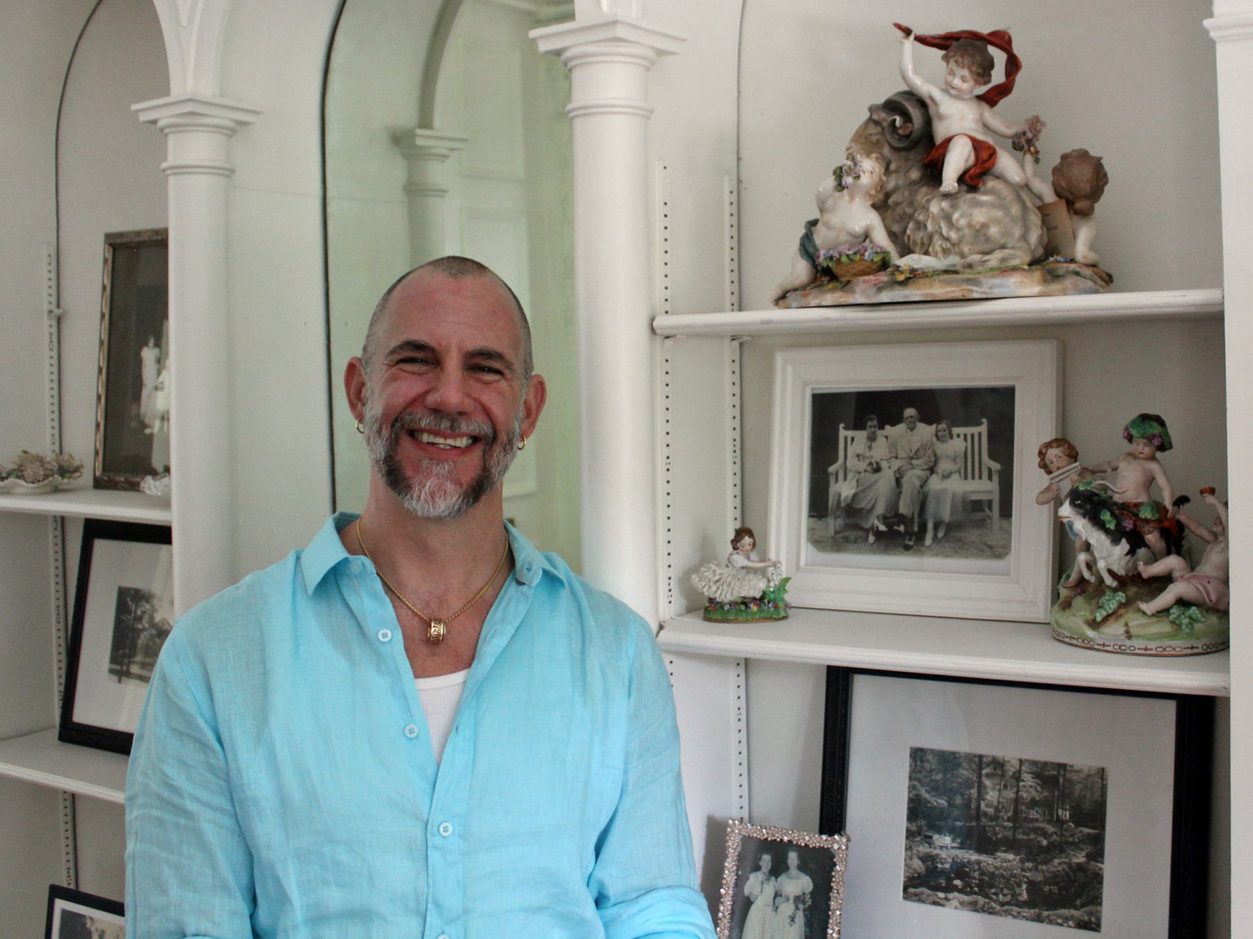 Cator Sparks with photos and memorabilia from his great-grandfather's era.